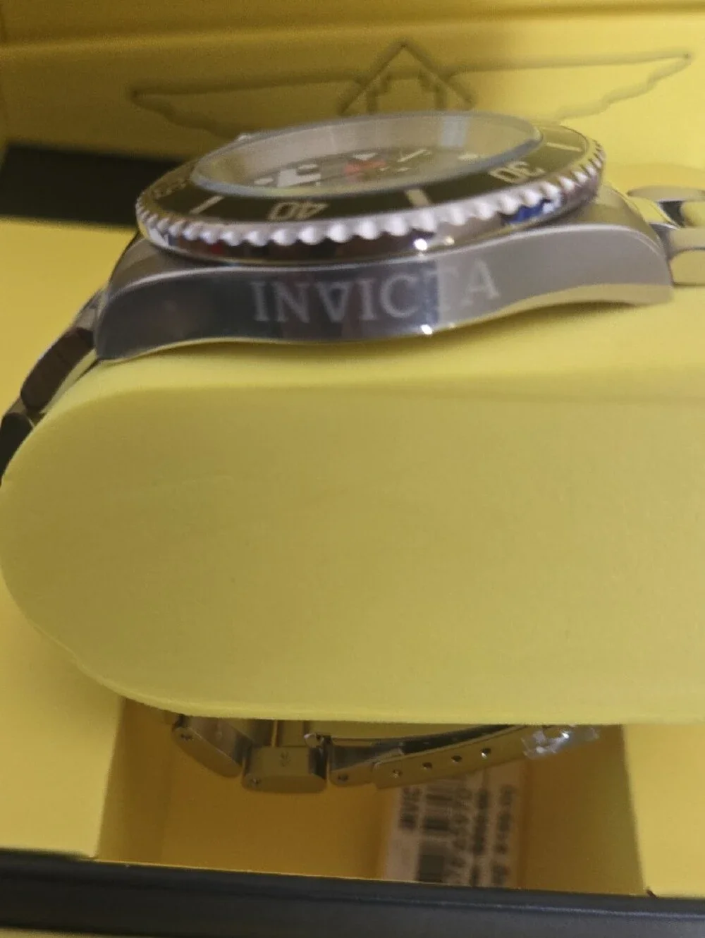 Invicta Men’s Pro Diver Silver Watch with Black Bezel and Multi-Color Dial